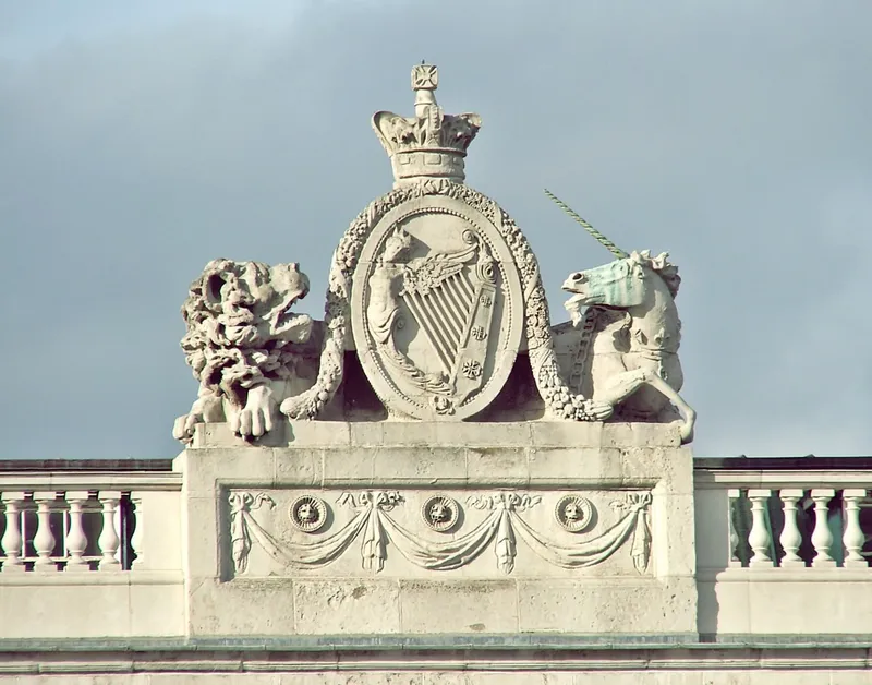 Royal coat of arms with lion and unicorn flanking crowned shield
